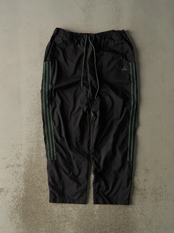 Vintage 90s Black Adidas Green Striped Track Pants (32x29.5) sold by Rebalance Vintage