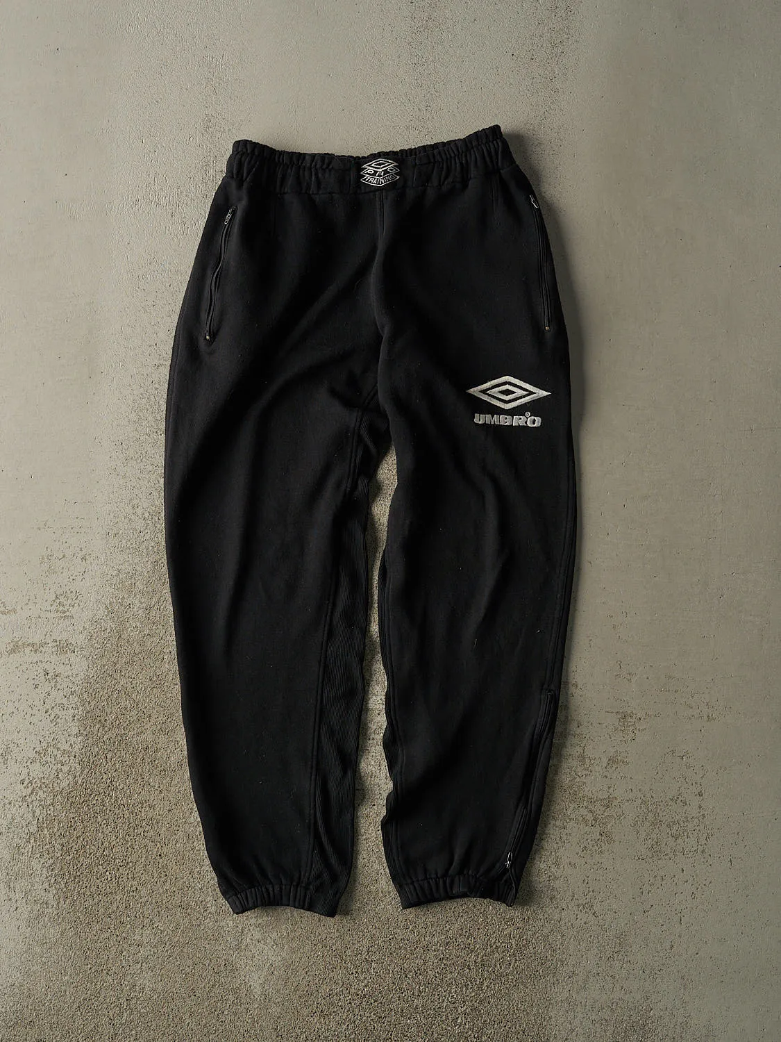 Vintage 90s Black Umbro Embroidered Sweat Pants (30x32) sold by Rebalance Vintage