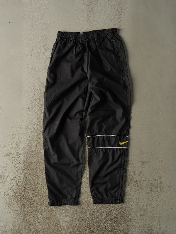 Vintage 90s Black Nike Embroidered Logo Track Pants (28x31) sold by Rebalance Vintage