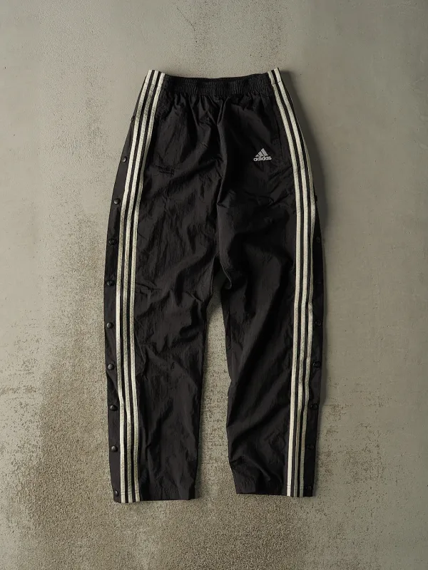 Vintage 90s Black Adidas Striped Tear Away Track Pants (26x29.5) sold by Rebalance Vintage