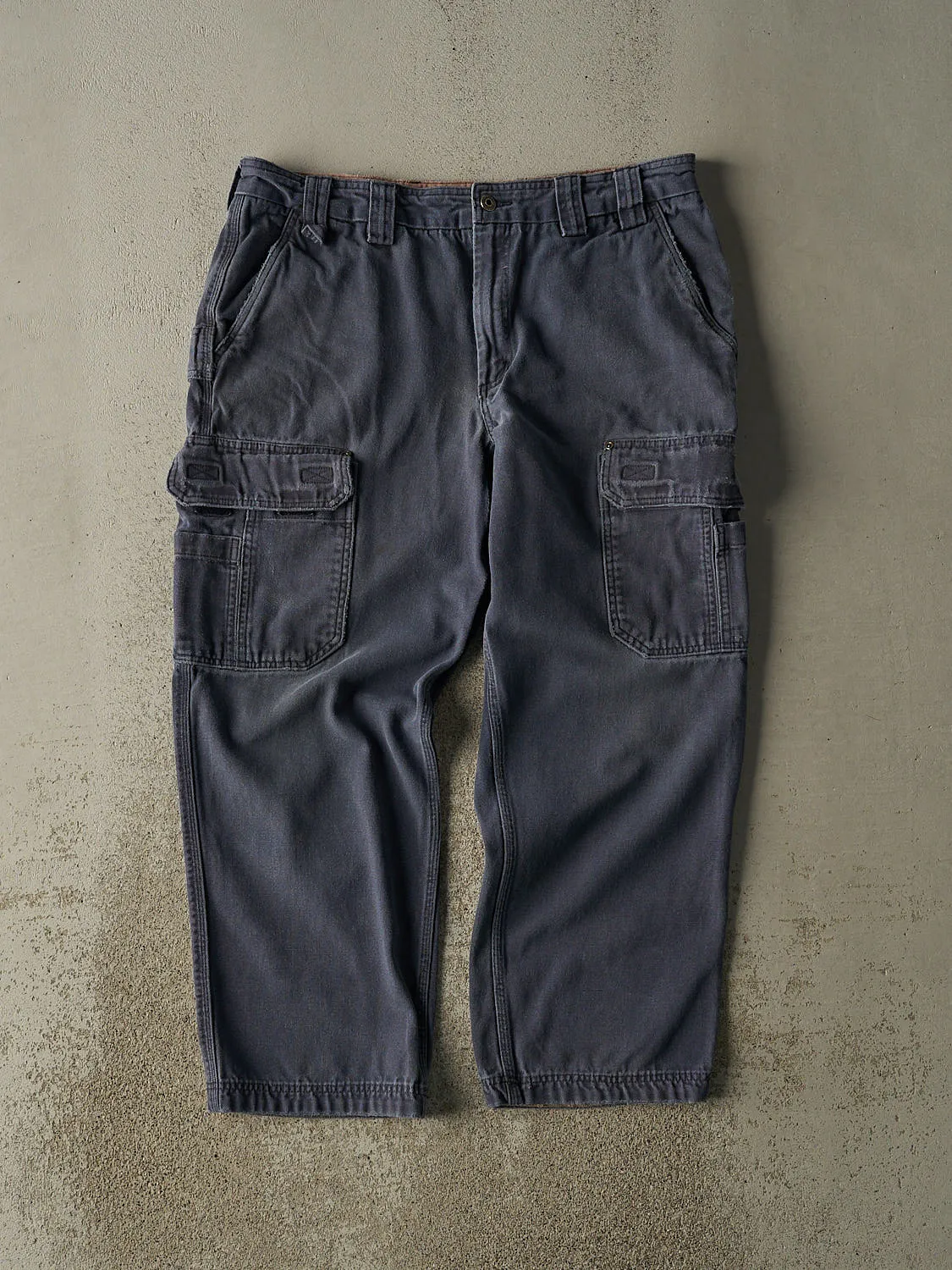 Vintage 90s Sun Faded Navy Cargo Utility Pants (36x28) sold by Rebalance Vintage