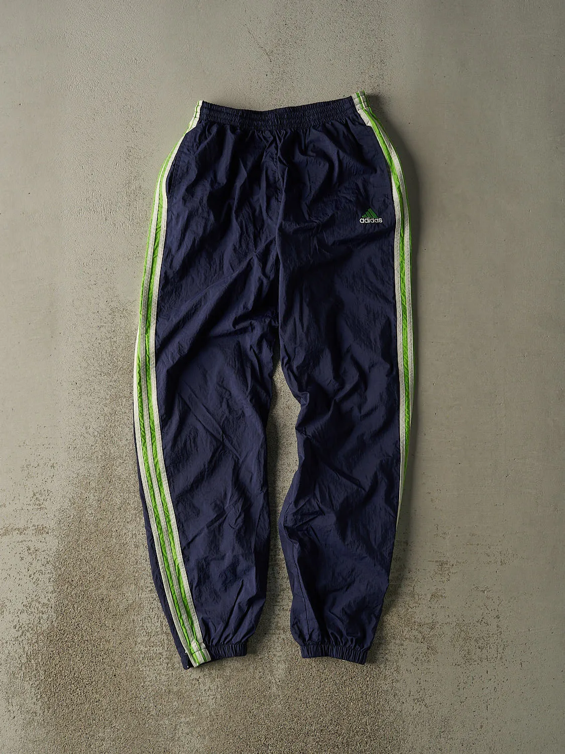 Vintage 90s Navy Blue Adidas Striped Track Pants (26x30) sold by Rebalance Vintage