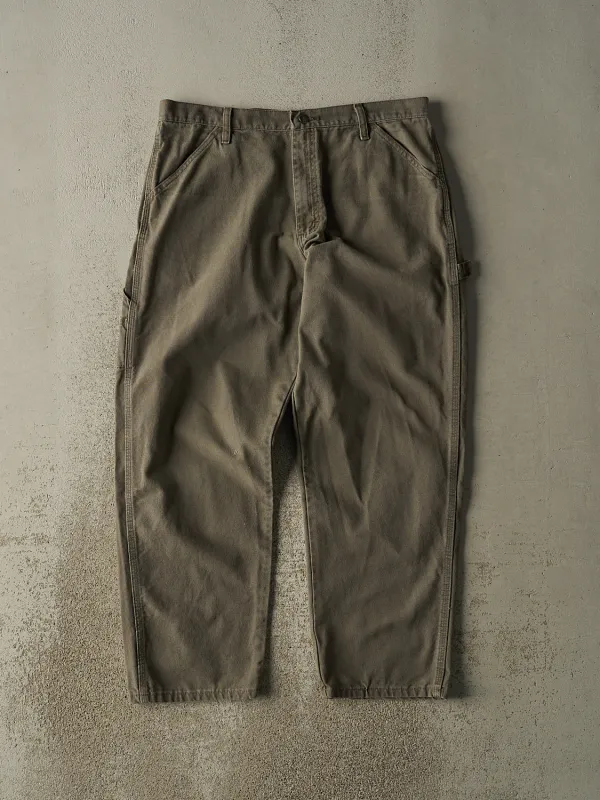 Vintage 90s Green Rustler Carpenter Pants (35x30) sold by Rebalance Vintage