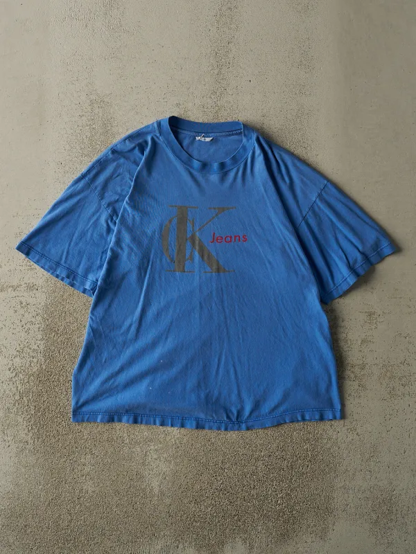 Vintage 90s Blue Calvin Klein Tee (M) sold by Rebalance Vintage