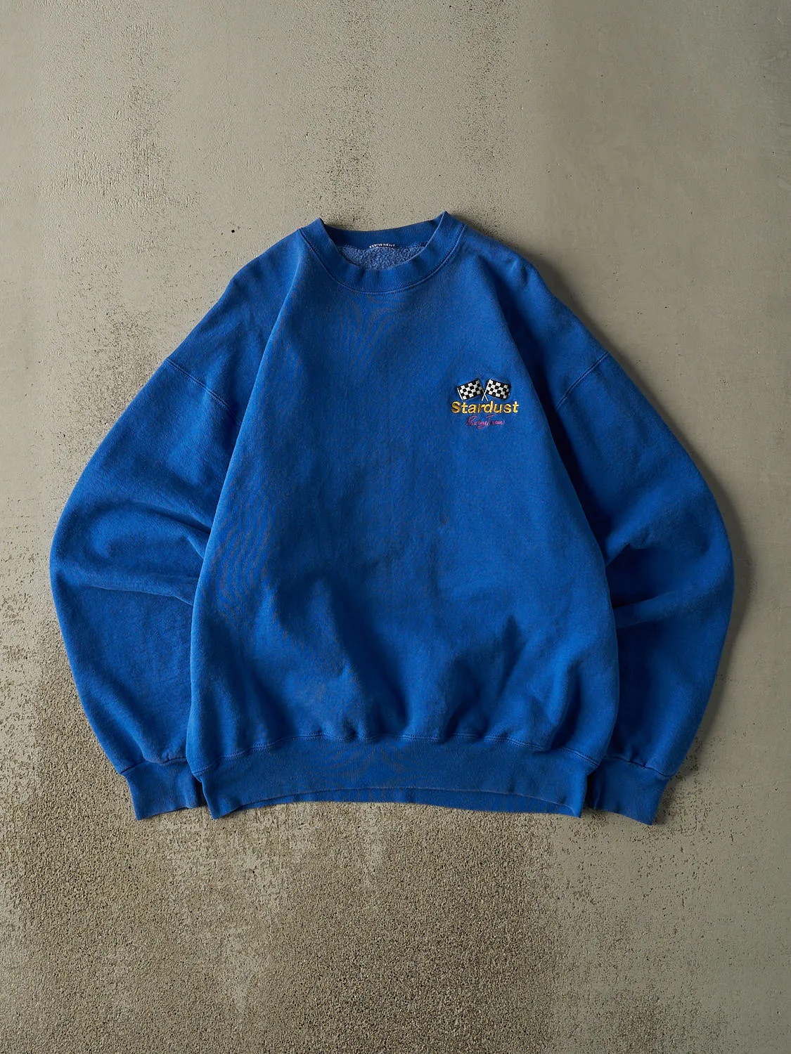 Vintage 80s Blue Stardust Racing Team Embroidered Crewneck (XL) sold by Rebalance Vintage