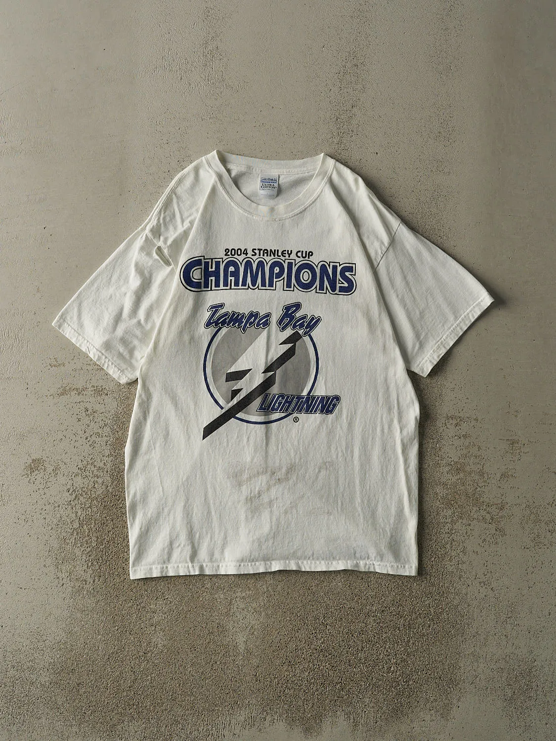 Vintage 04' White Tampa Bay Lightning Stanley Cup Champions Tee (L/XL) sold by Rebalance Vintage