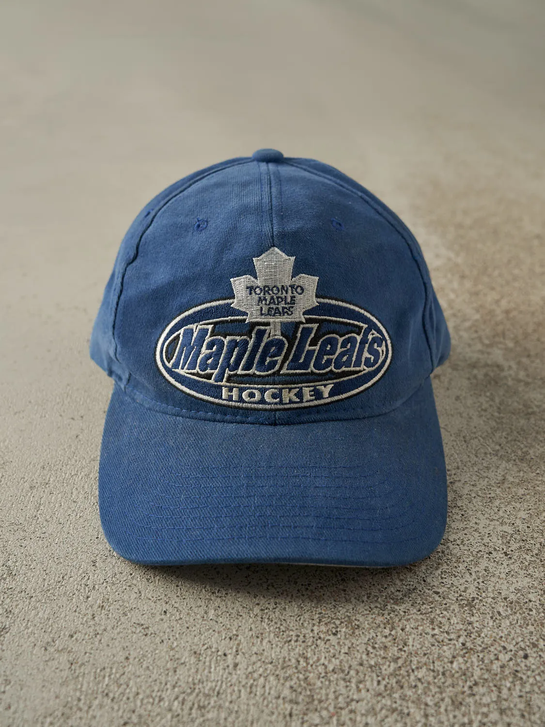 Vintage 90s Blue Toronto Maple Leafs Starter Embroidered Velcro Hat sold by Rebalance Vintage