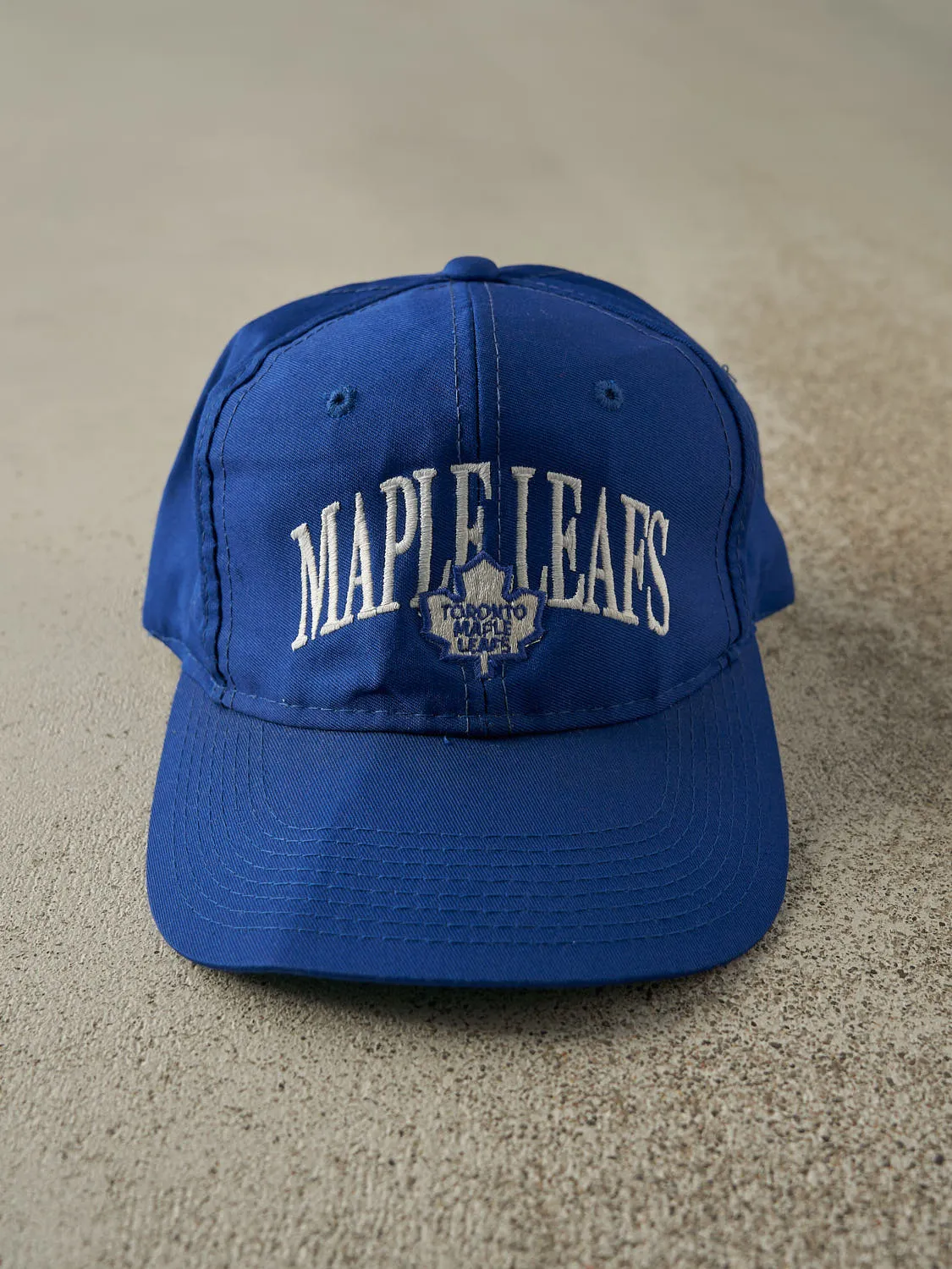 Vintage 90s Blue Toronto Maple Leafs Embroidered Snapback sold by Rebalance Vintage