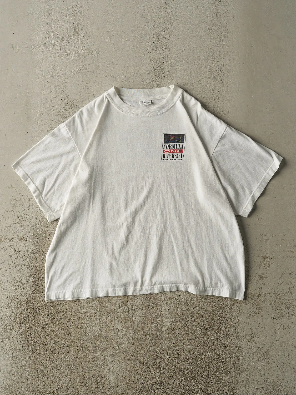 Vintage 90s White Formula One Dubai Tee (M/L) sold by Rebalance Vintage