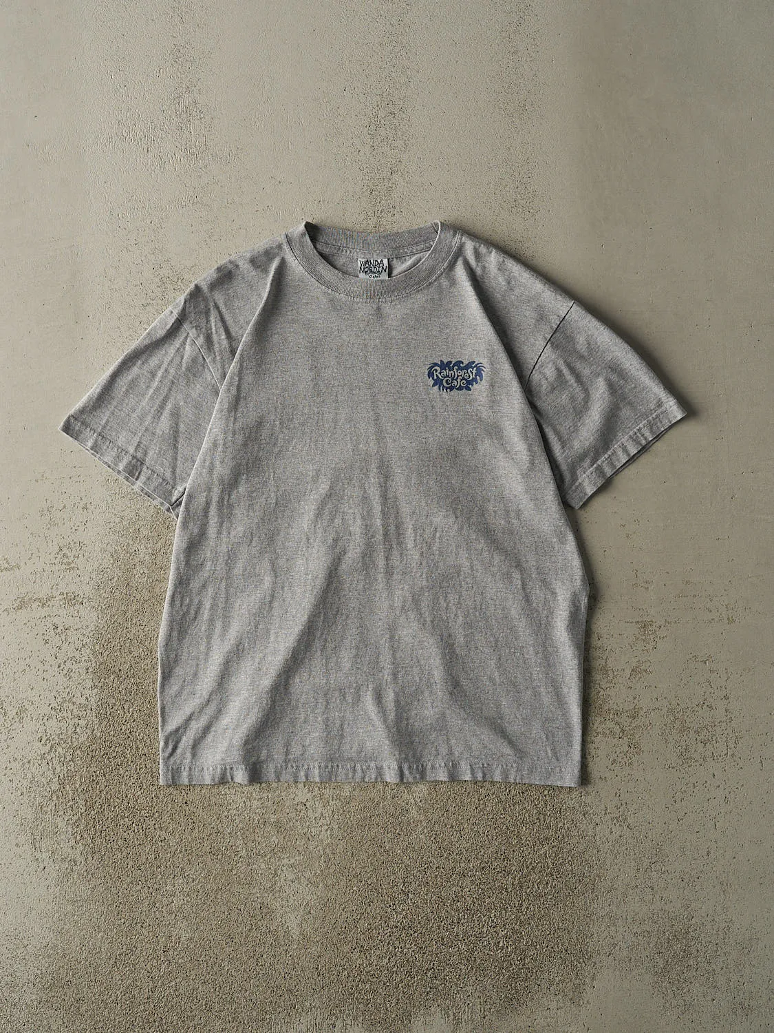 Vintage Y2K Grey Rainforest Cafe San Antonio Tee (L) sold by Rebalance Vintage