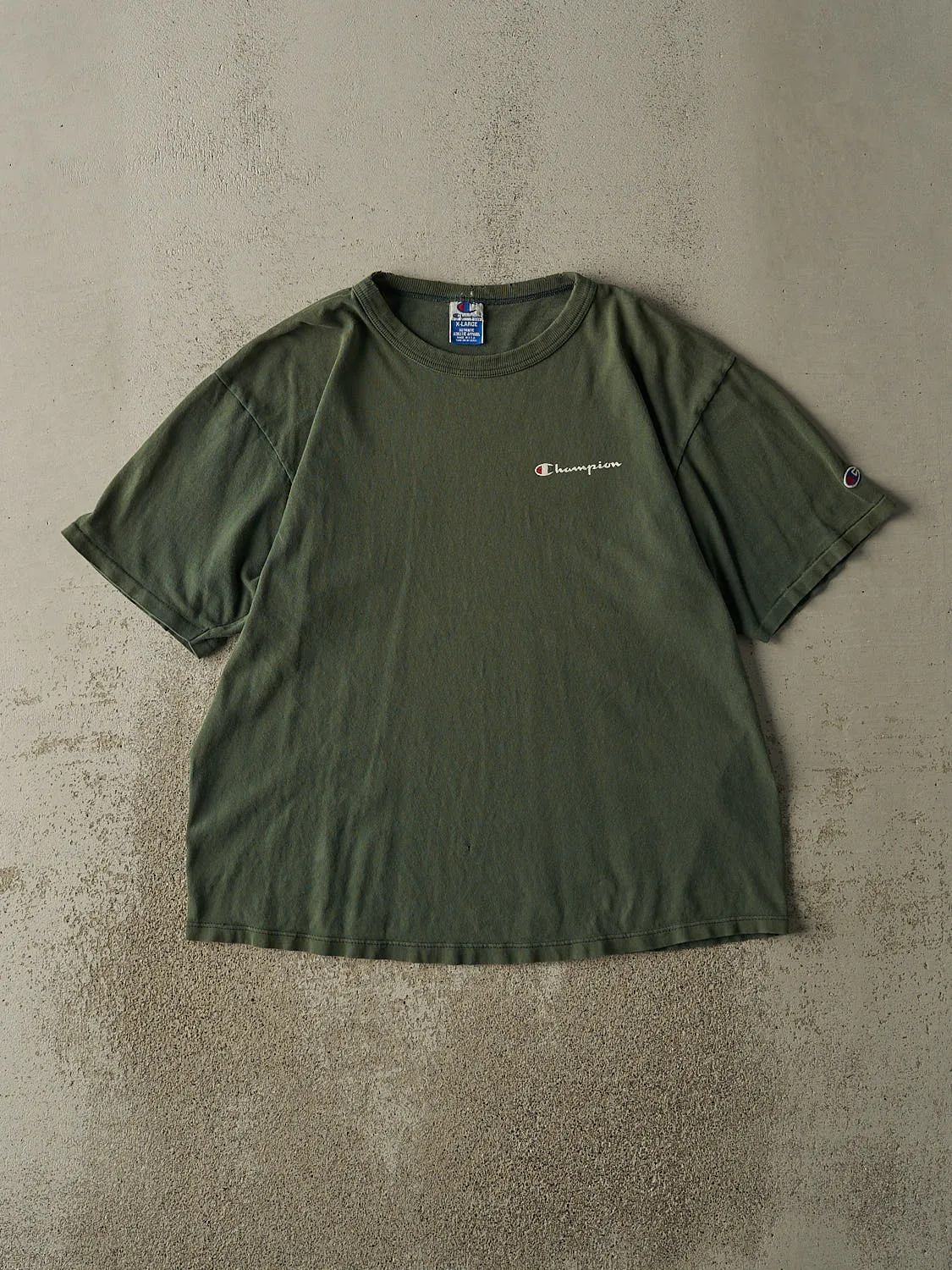 Vintage 90s Sun Faded Green Champion Logo Tee (L) sold by Rebalance Vintage