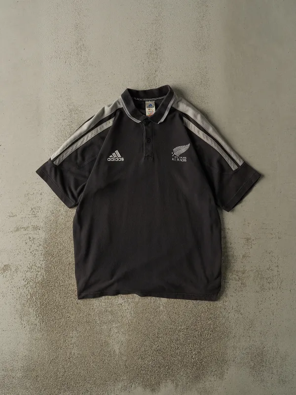Vintage 90s Black New Zealand All Blacks x Adidas Quarter Button Tee (L) sold by Rebalance Vintage