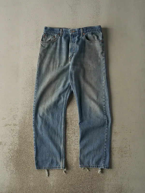 Vintage 90s Mid Wash Levi's Jeans (34x30.5) sold by Rebalance Vintage