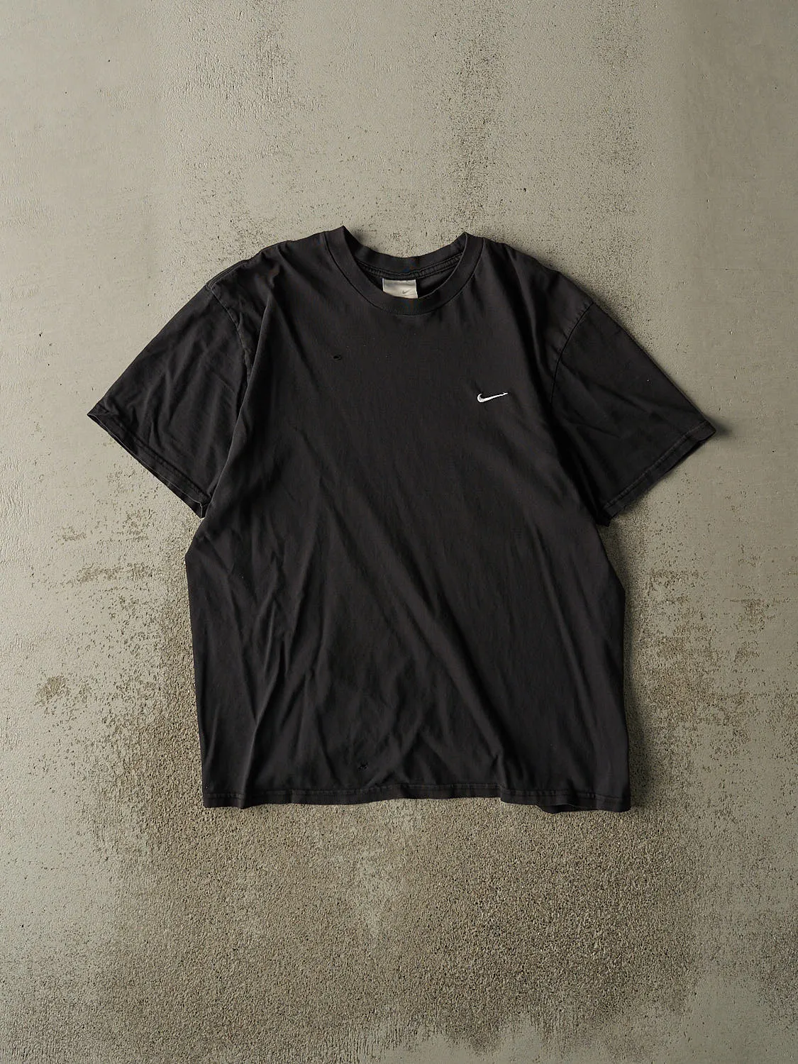 Vintage Y2K Faded Black Nike Embroidered Logo Tee (L/XL) sold by Rebalance Vintage