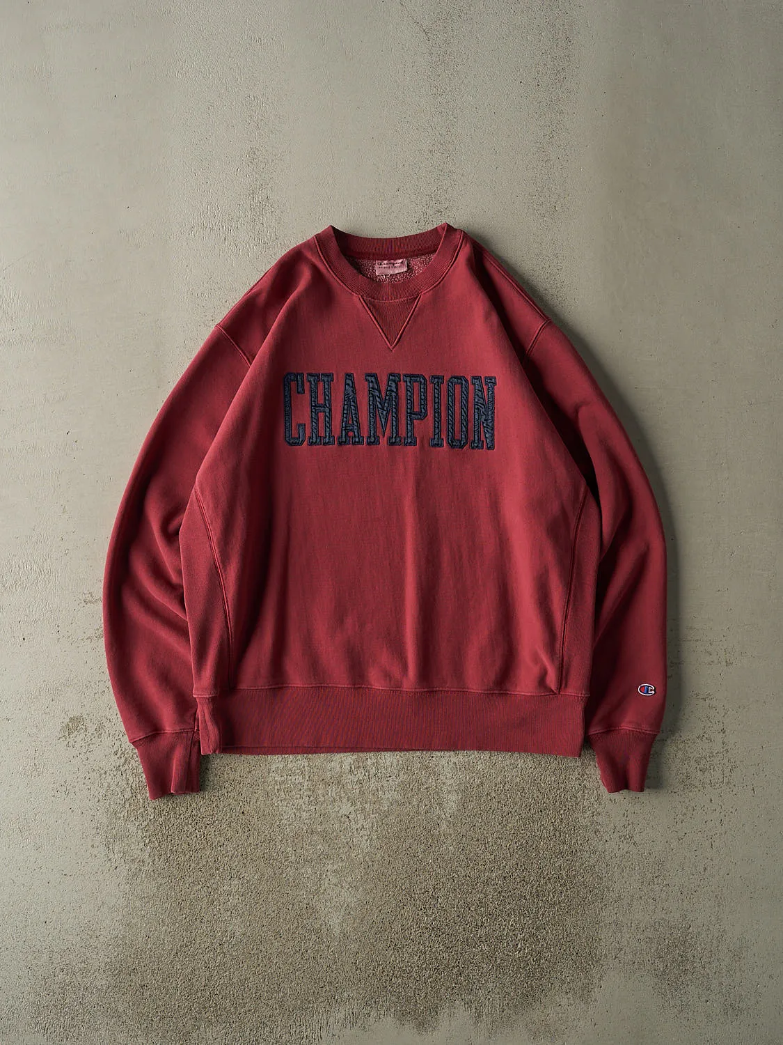 Vintage 90s Sun Faded Red Champion Embroidered Logo Crewneck (XXL/XXXL) sold by Rebalance Vintage