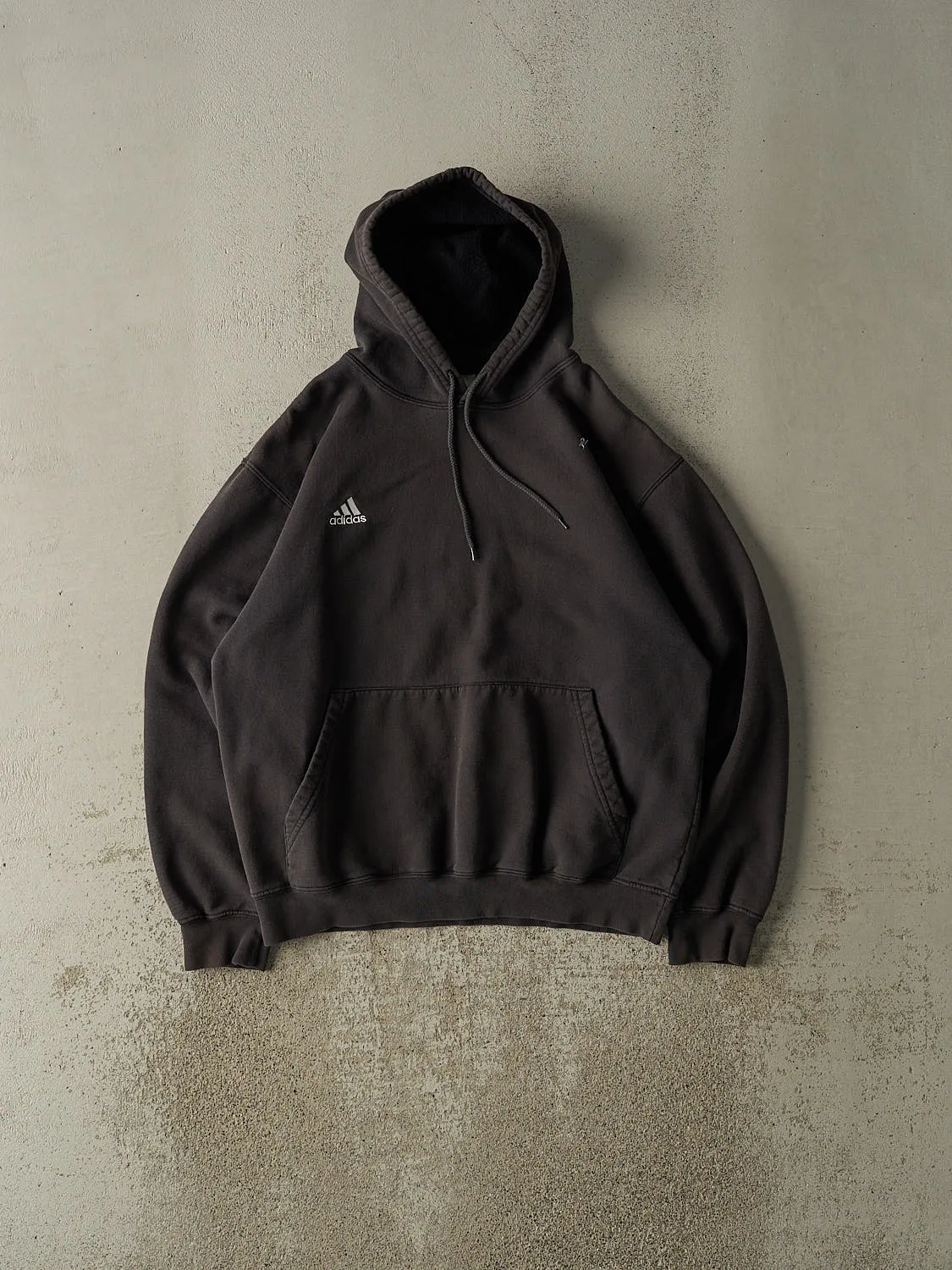 Vintage 90s Faded Black Adidas Embroidered Logo Hoodie (M) sold by Rebalance Vintage