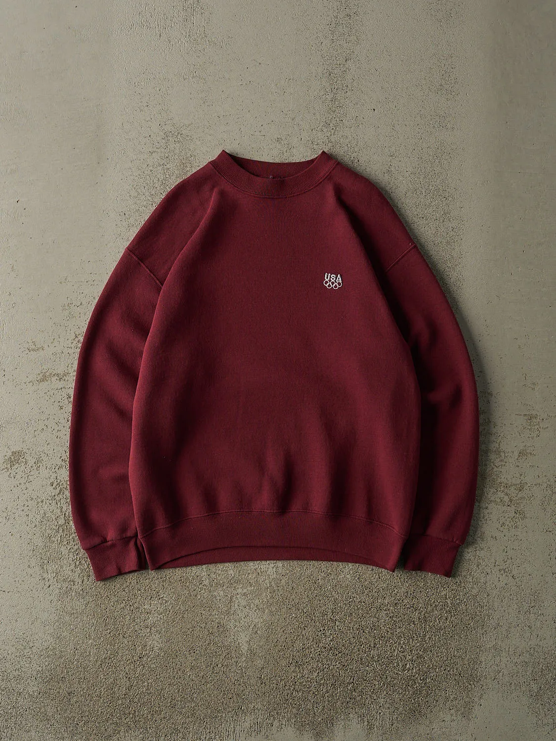Vintage 90s Burgundy USA Olympics Embroidered Crewneck (M) sold by Rebalance Vintage