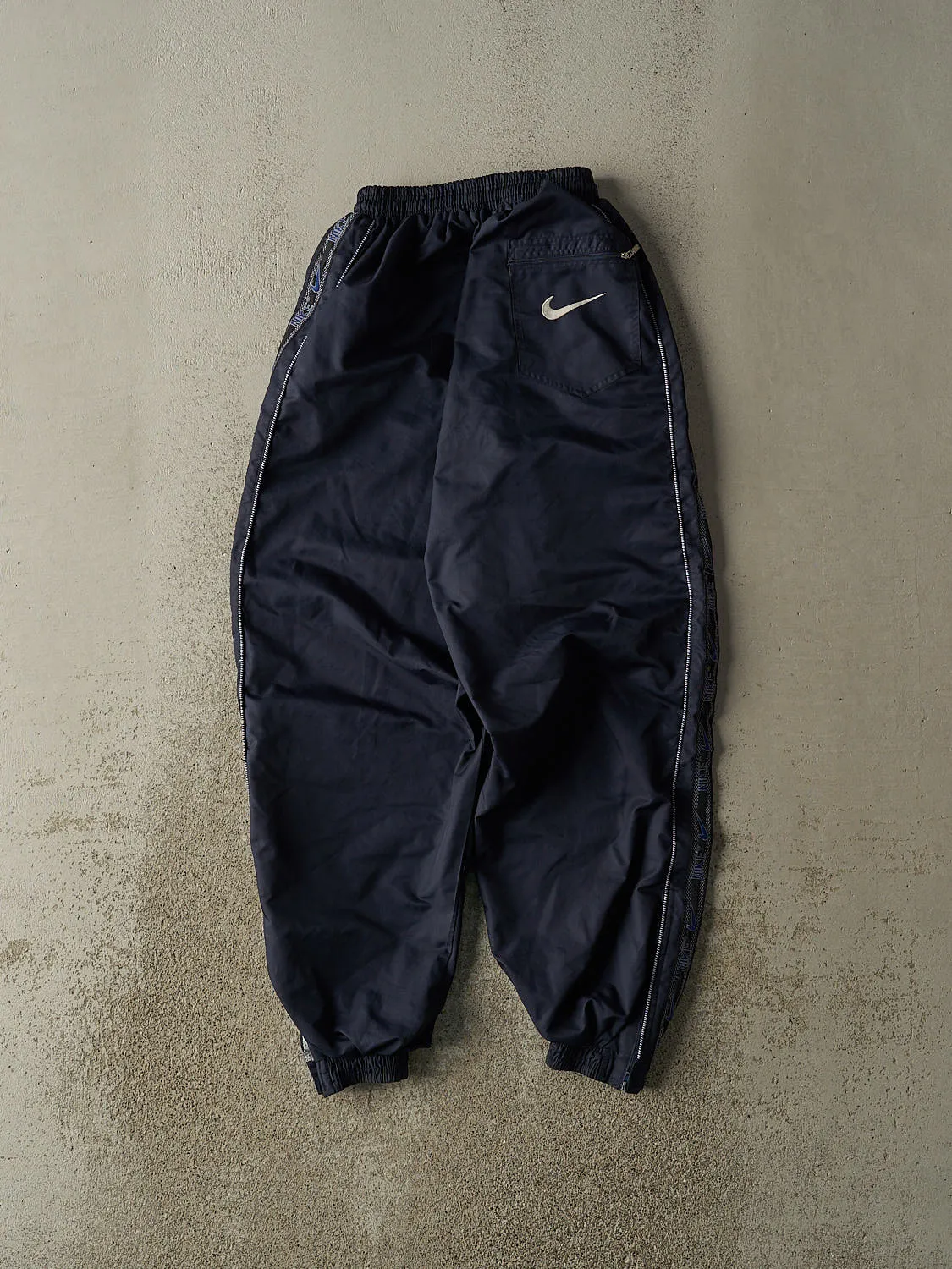 Vintage 90s Navy Blue Nike Embroidered Track Pants (22x27) sold by Rebalance Vintage product image thumbnail 2