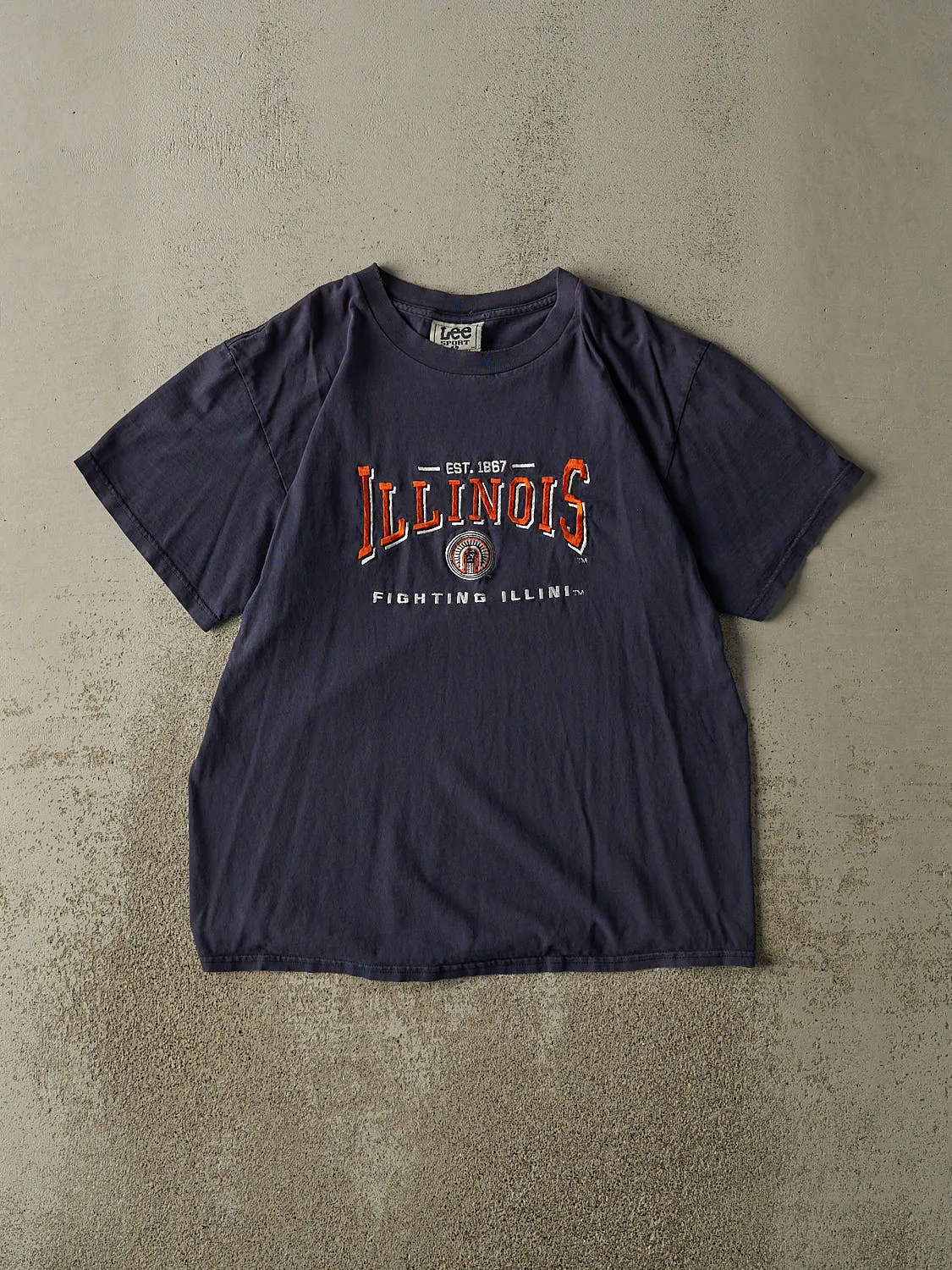 Vintage 90s Sun Faded Navy Illinois Fighting Illini Tee (M/L) sold by Rebalance Vintage