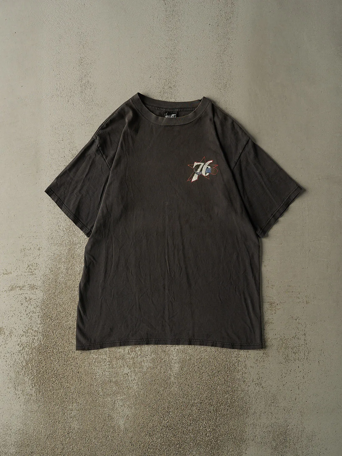 Vintage 90s Sun Faded Black Philadelphia 76ers Tee (L/XL) sold by Rebalance Vintage