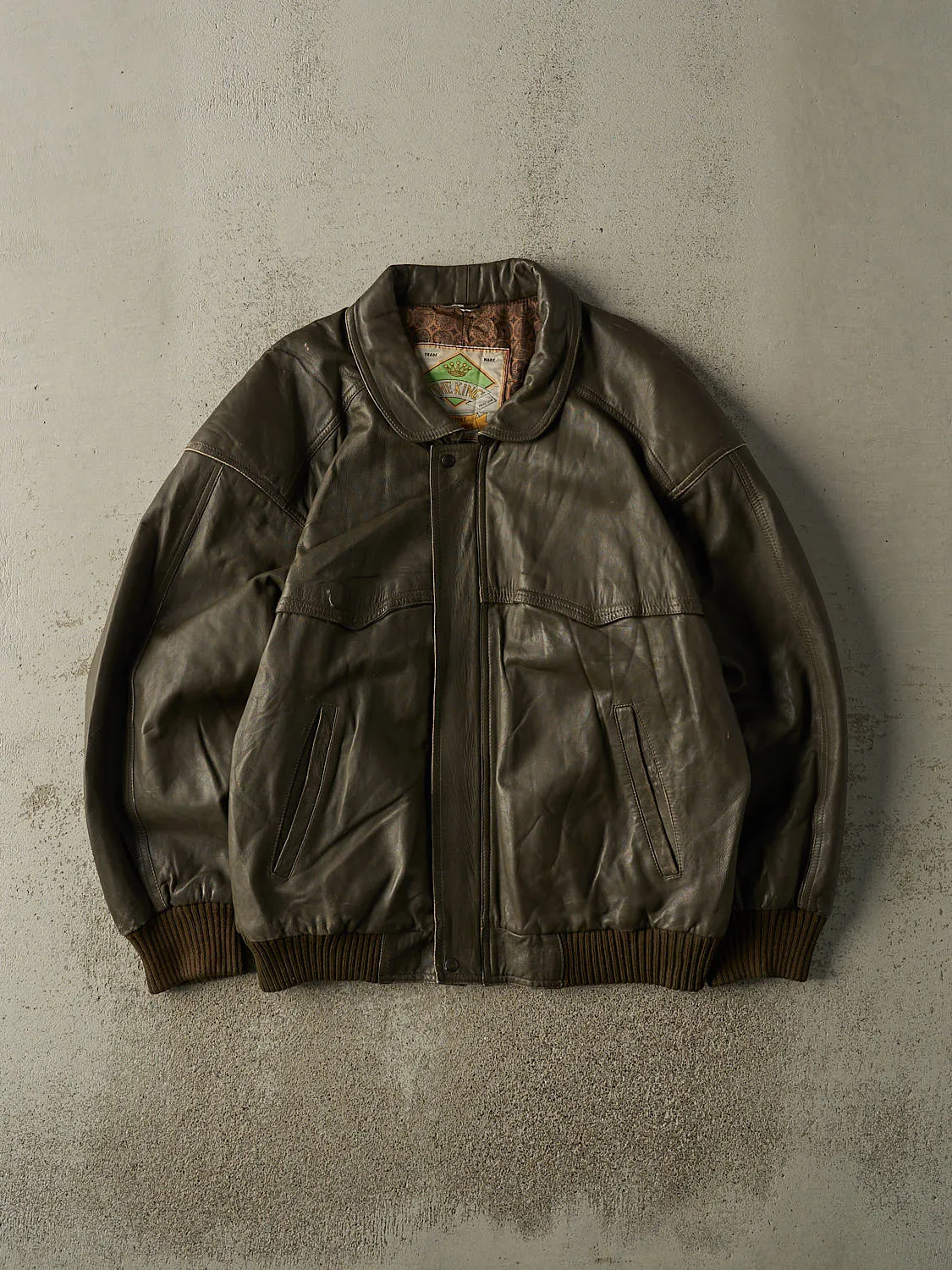 Vintage 90s Brown Leather Bomber Jacket (XL) sold by Rebalance Vintage