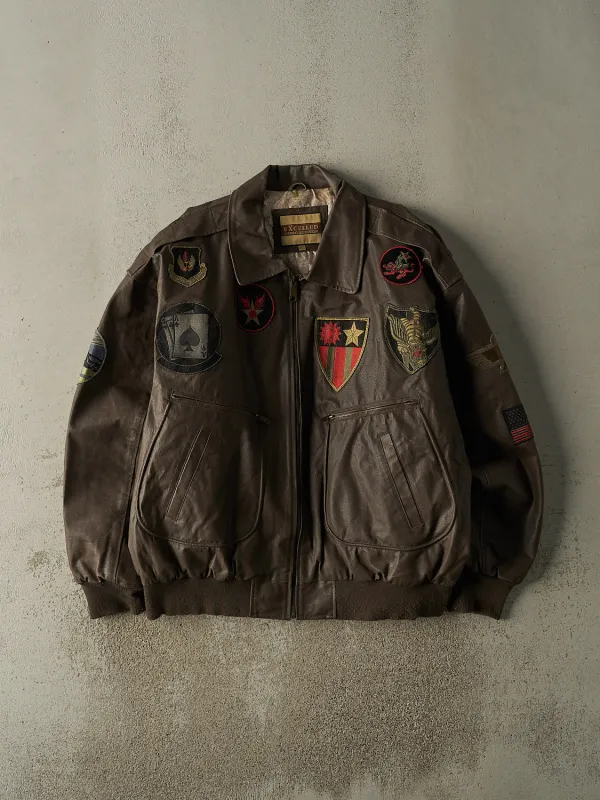 Vintage Y2K Brown Patched Leather Flight Jacket (XXL) sold by Rebalance Vintage