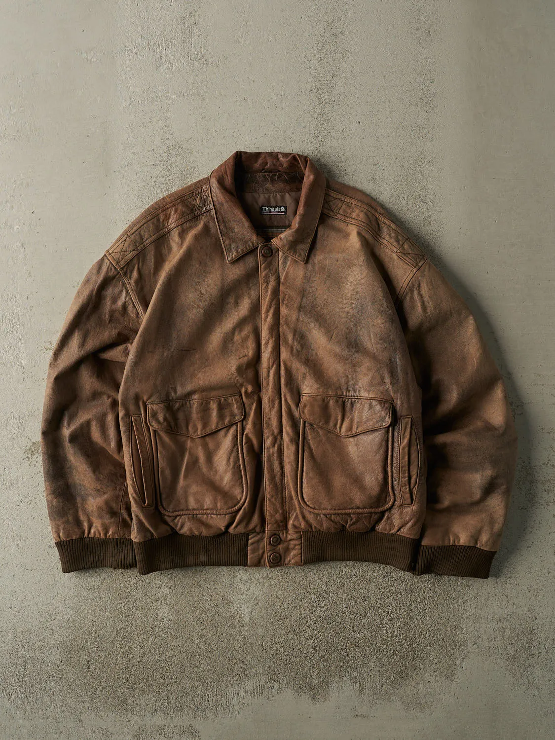 Vintage 90s Faded Brown Wilsons Bomber Flight Jacket (XL) sold by Rebalance Vintage