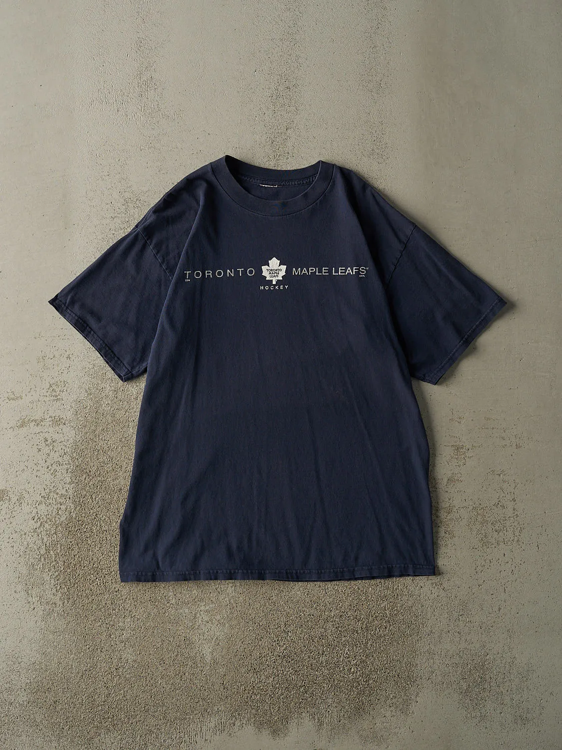 Vintage 90s Navy Blue Toronto Maple Leafs Tee (L/XL) sold by Rebalance Vintage