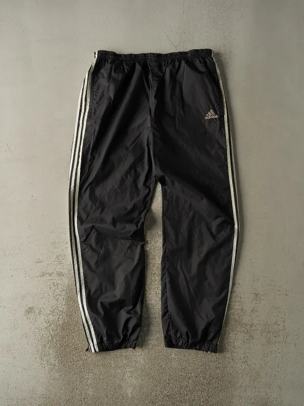 Vintage 90s Black Adidas Striped Track Pants (36x32.5) sold by Rebalance Vintage