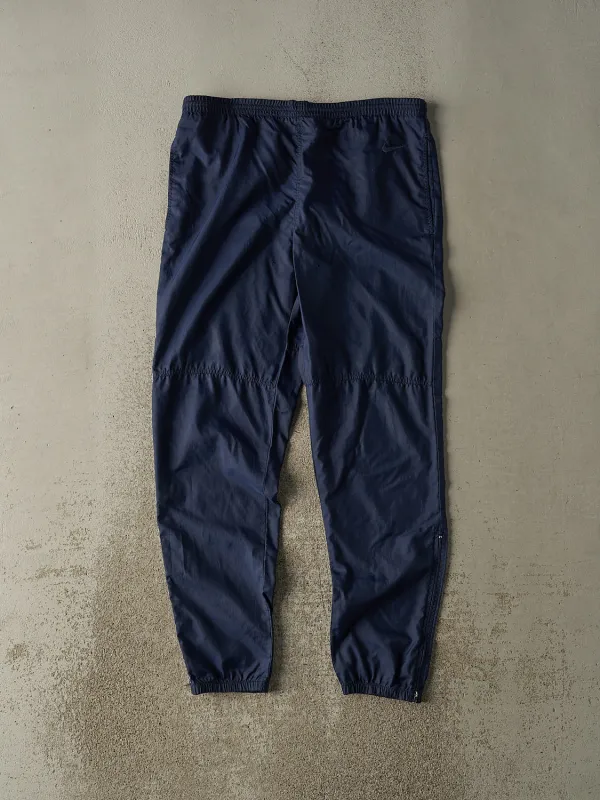 Vintage 90s Navy Blue Nike Embroidered Track Pants (35x32) sold by Rebalance Vintage