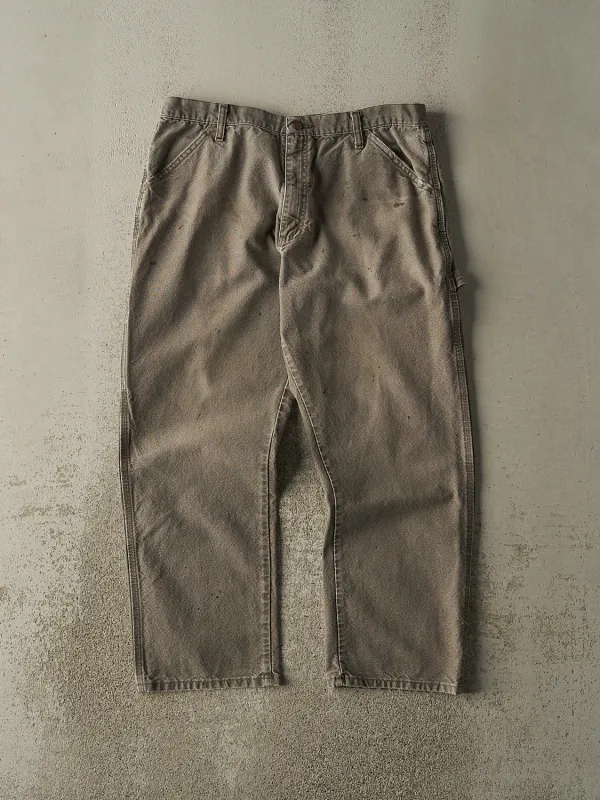Vintage 90s Washed Green Rustler Carpenter Pants (35x28.5) sold by Rebalance Vintage