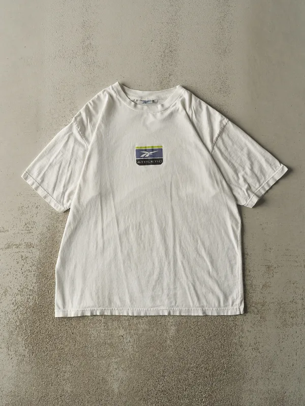 Vintage 90s White Reebok Tee (L/XL) sold by Rebalance Vintage