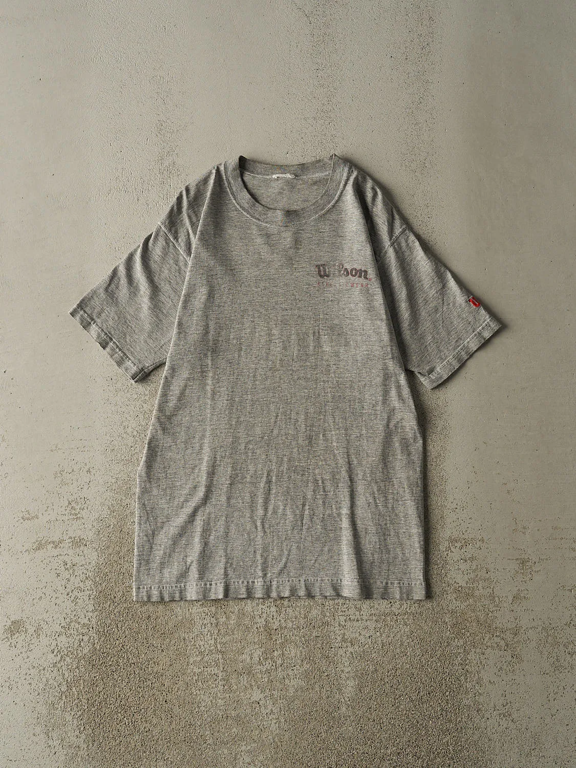 Vintage 90s Grey Wilson Tee (S/M) sold by Rebalance Vintage