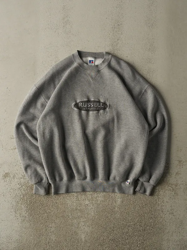 Vintage 90s Grey Russell Athletic Embroidered Logo Crewneck (L/XL) sold by Rebalance Vintage