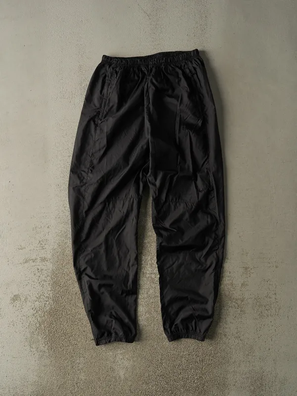 Vintage 90s Black Nike Track Pants (29x30.5) sold by Rebalance Vintage