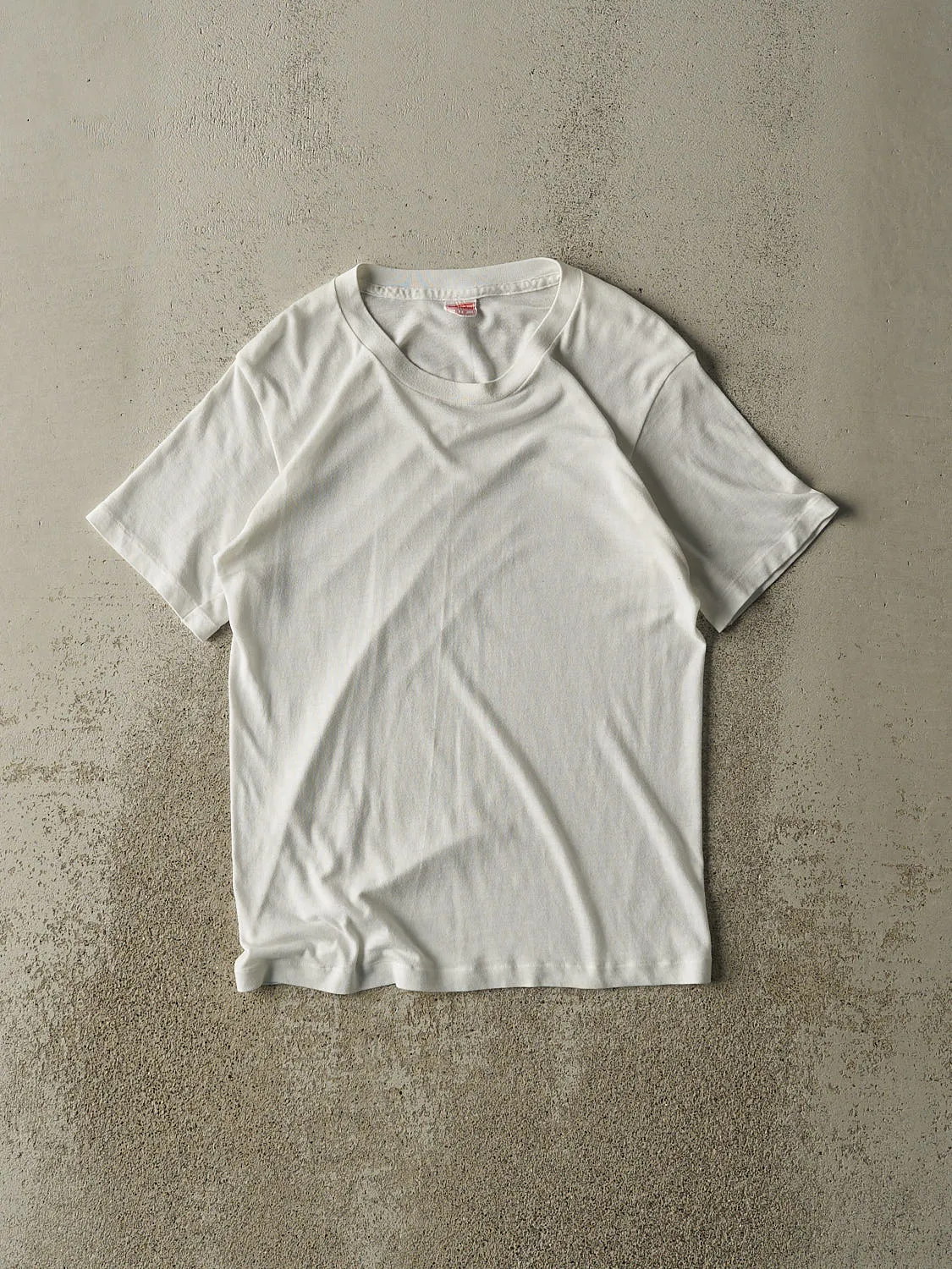 Vintage 80s White Blank Single Stitch Tee (S/M) sold by Rebalance Vintage