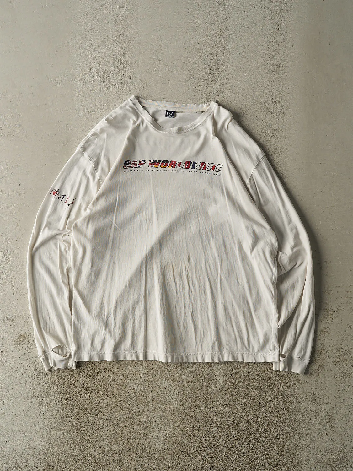 Vintage 90s White Gap Worldwide Long Sleeve (XL) sold by Rebalance Vintage