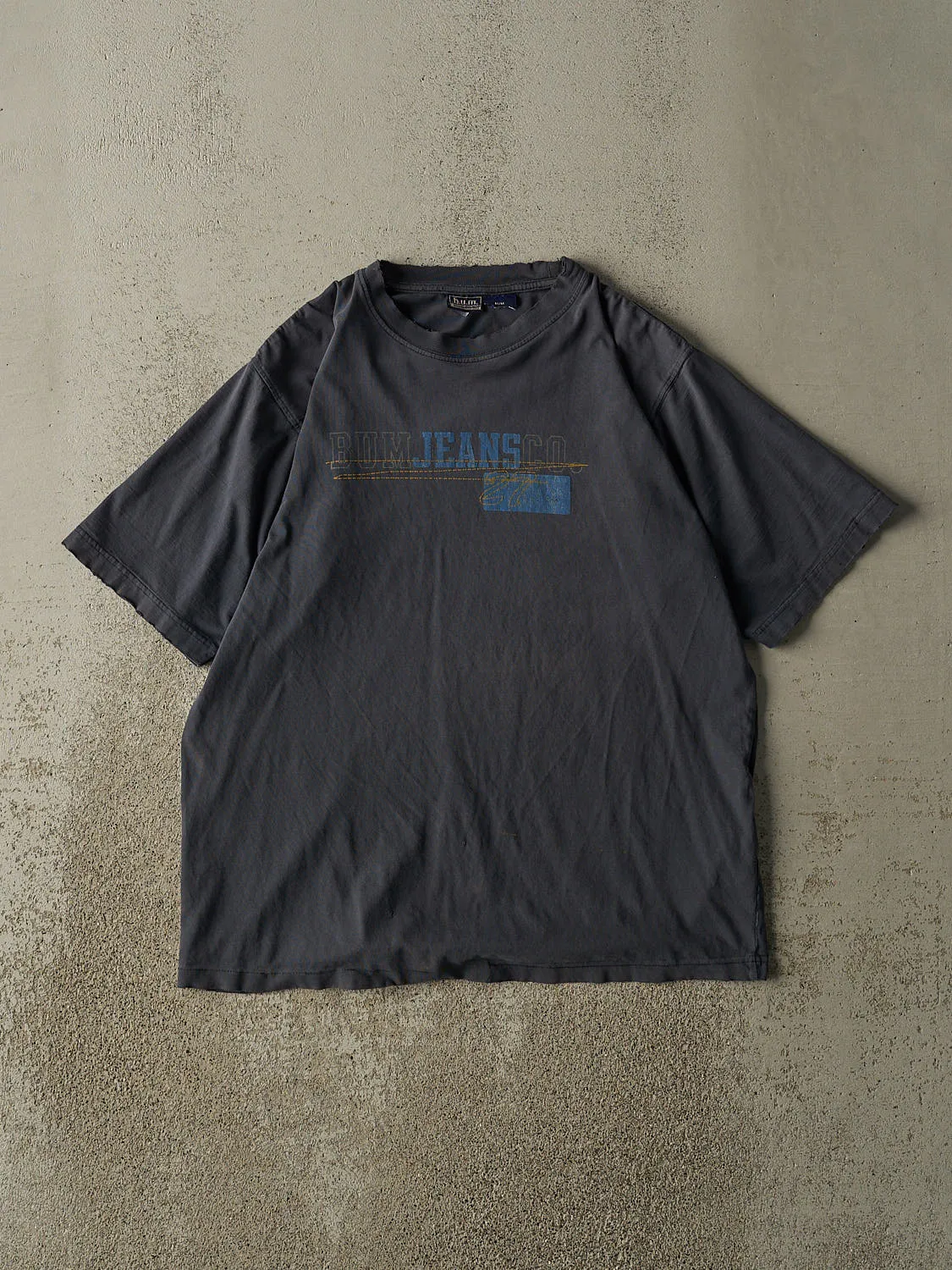 Vintage 90s Navy Blue BUM Jeans Co Tee (M) sold by Rebalance Vintage