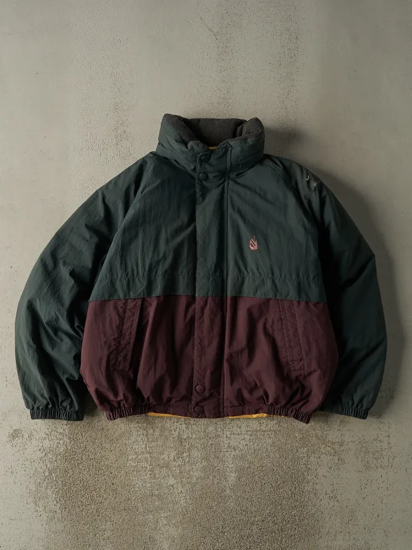 Vintage 90s Green & Burgundy Nautica Embroidered Puffer Jacket (XL) sold by Rebalance Vintage