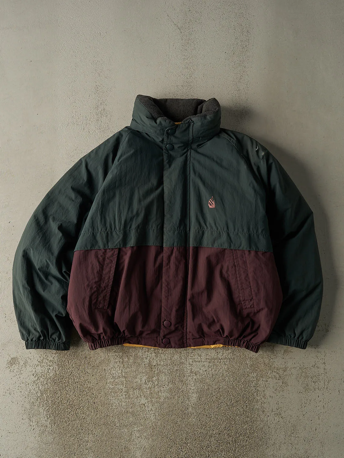 Vintage 90s Green & Burgundy Nautica Embroidered Puffer Jacket (XL) sold by Rebalance Vintage