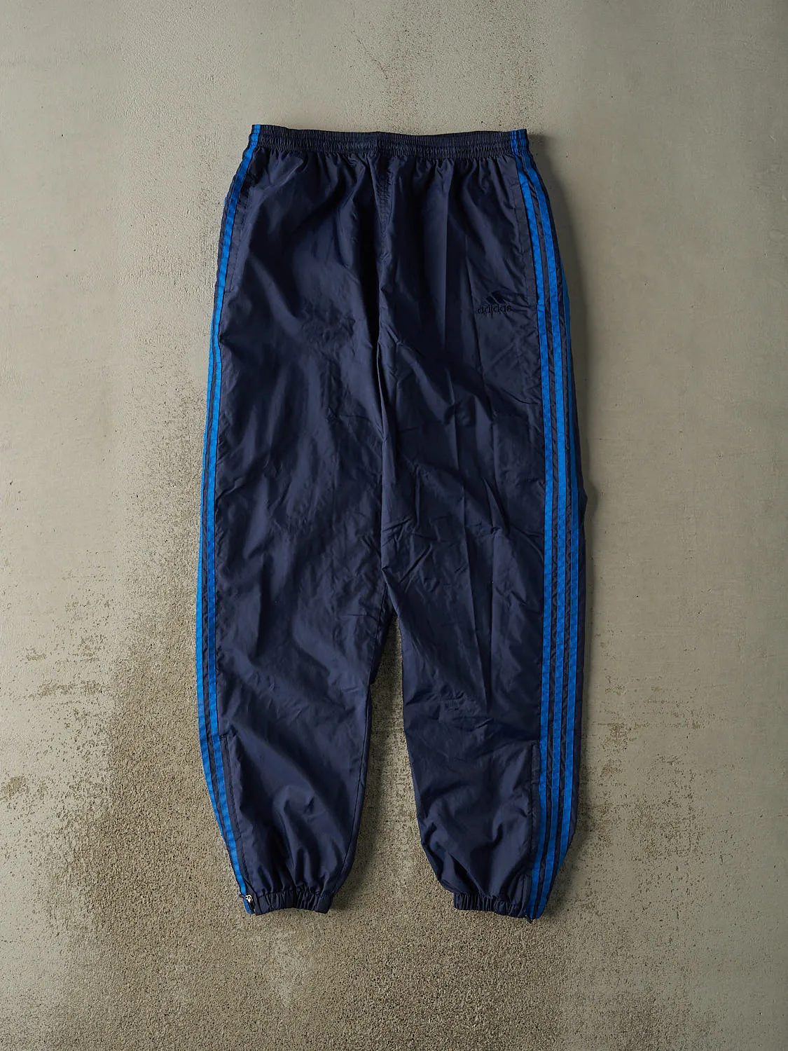 Vintage 90s Navy Blue Adidas Embroidered Track Pants (33x31.5) sold by Rebalance Vintage