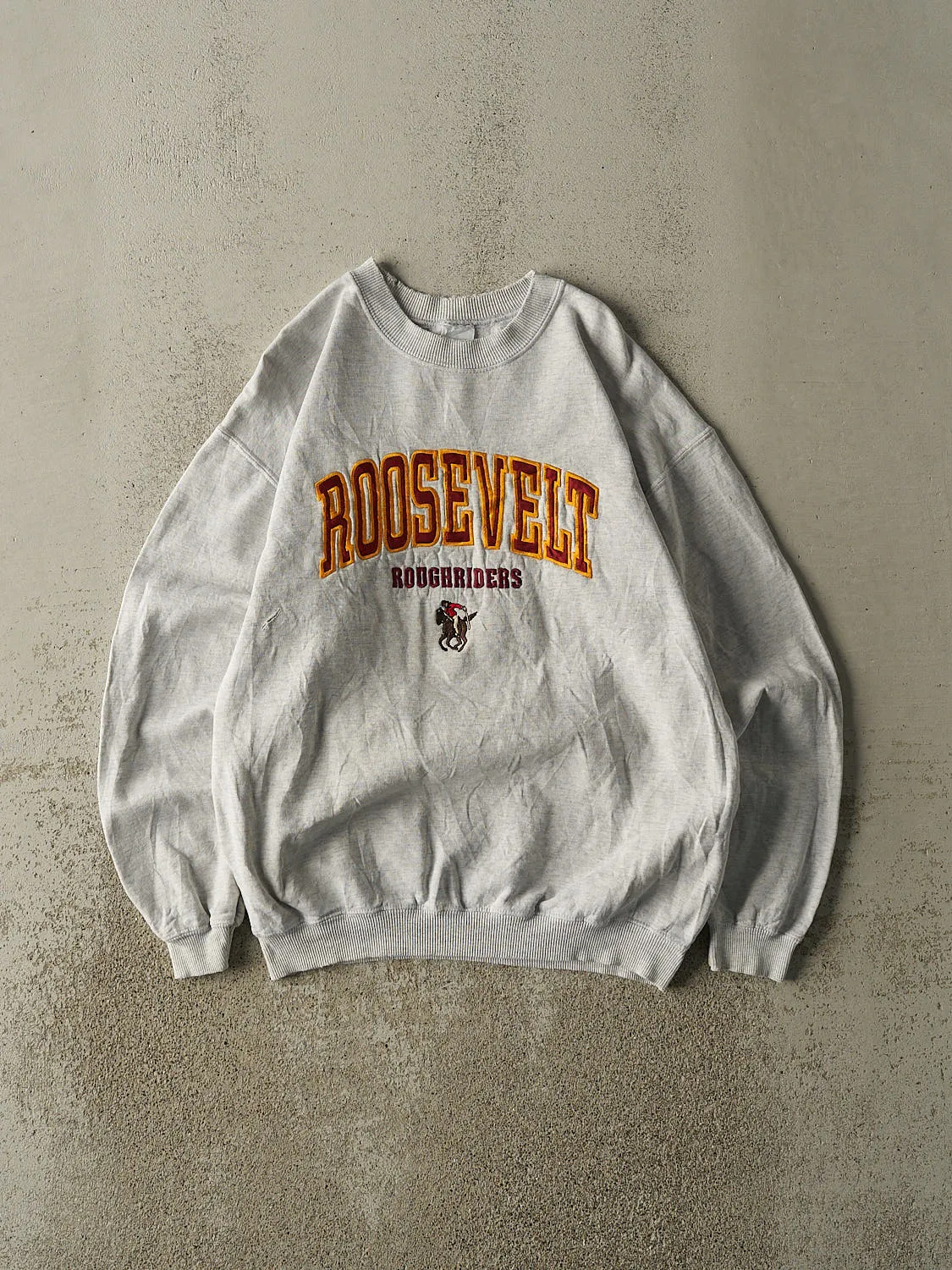 Vintage 90s Heather Grey Roosevelt Roughriders Embroidered Crewneck (M/L) sold by Rebalance Vintage