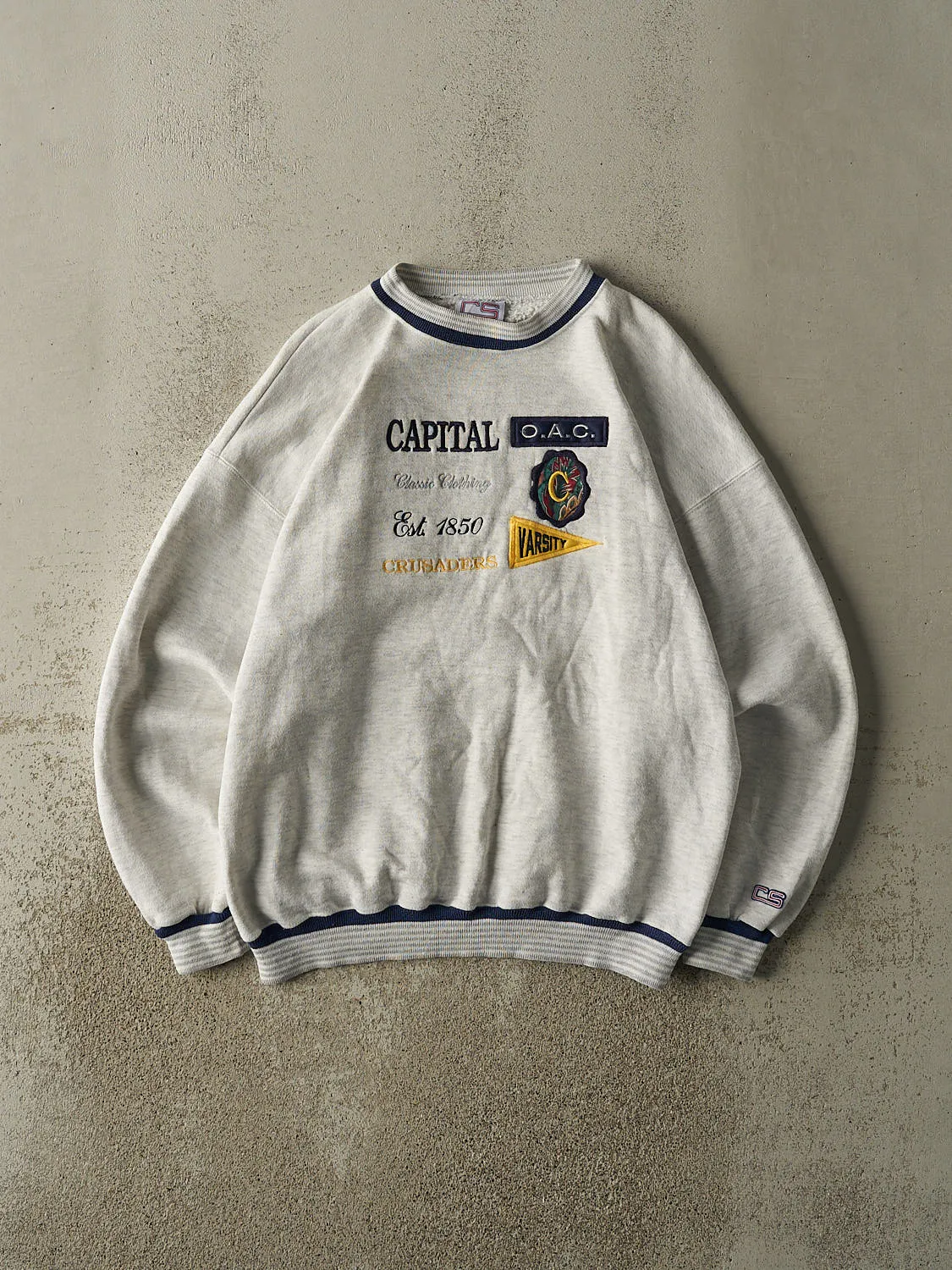Vintage 90s Heather Grey Capital Crusaders Embroidered Ribbed Crewneck (L/XL) sold by Rebalance Vintage