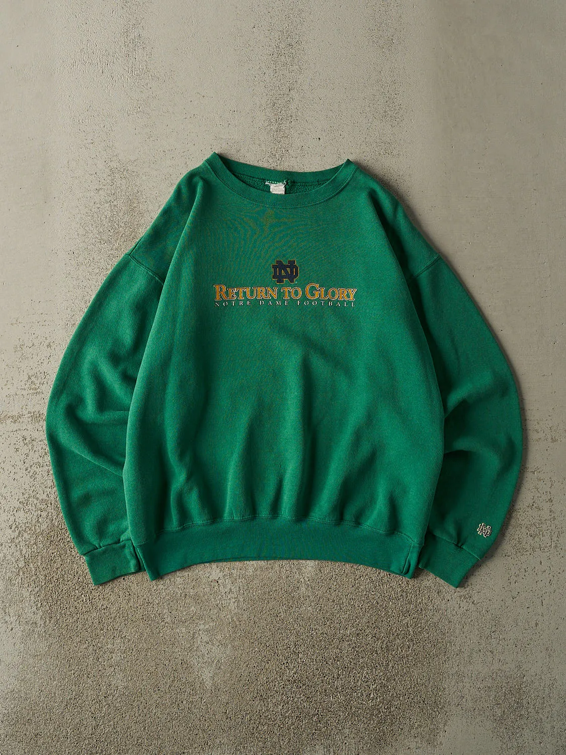 Vintage 90s Green University of Notre Dame Football Crewneck (L/XL) sold by Rebalance Vintage