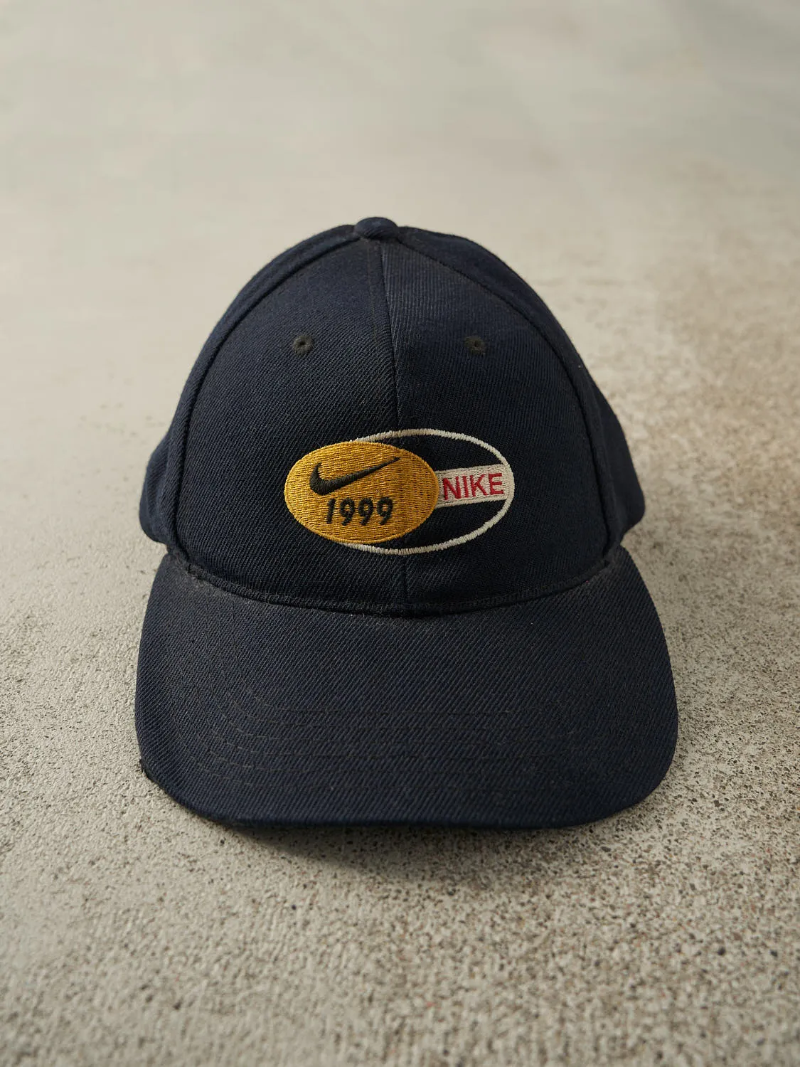 Vintage 99' Faded Black Nike Embroidered Snapback (O/S) sold by Rebalance Vintage