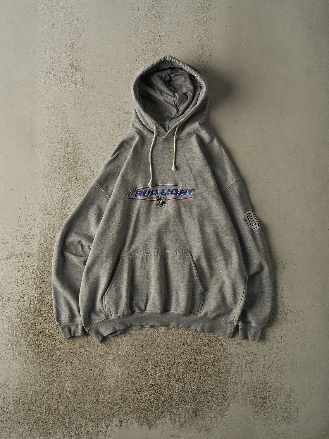 Vintage 90s Grey Bud Light NHL Embroidered Hoodie (L/XL) sold by Rebalance Vintage