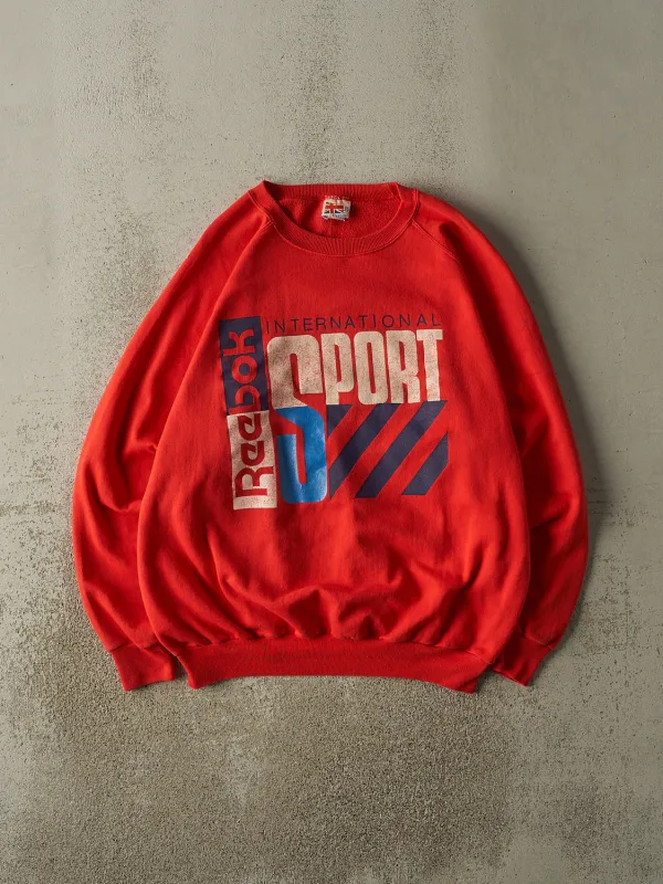 Vintage 80s Red Reebok Sport Crewneck (XL) sold by Rebalance Vintage