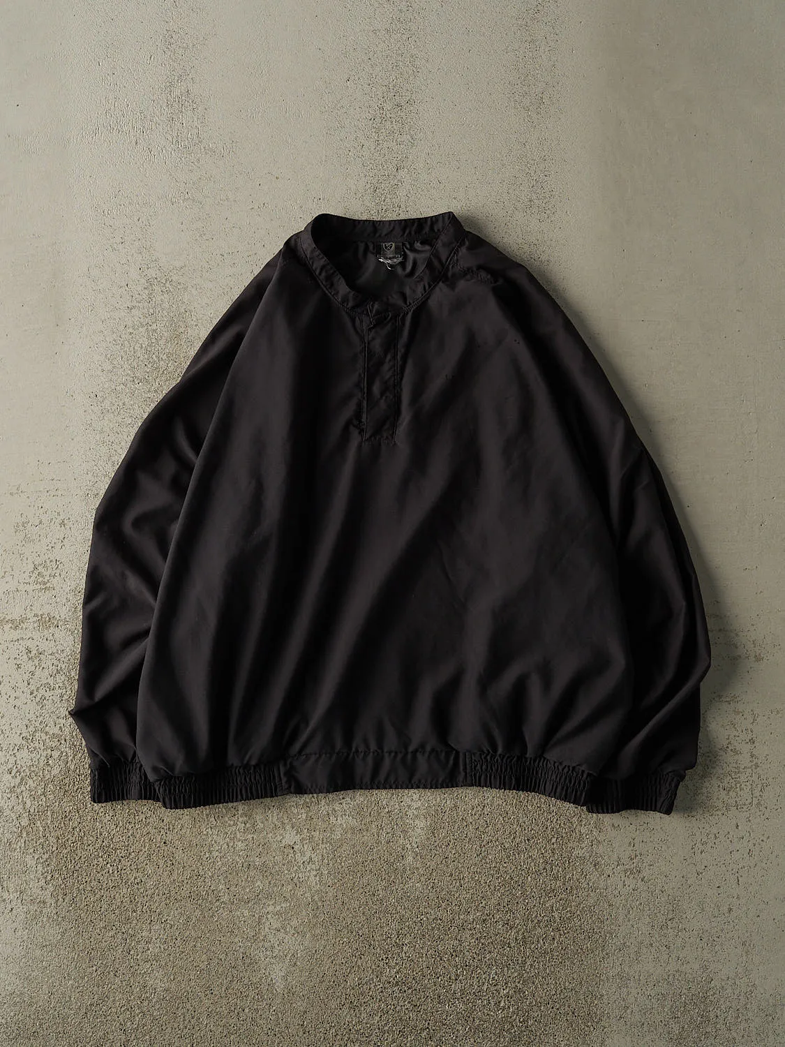 Vintage Y2K Black Nike Golf Quarter Button Windbreaker (L/XL) sold by Rebalance Vintage