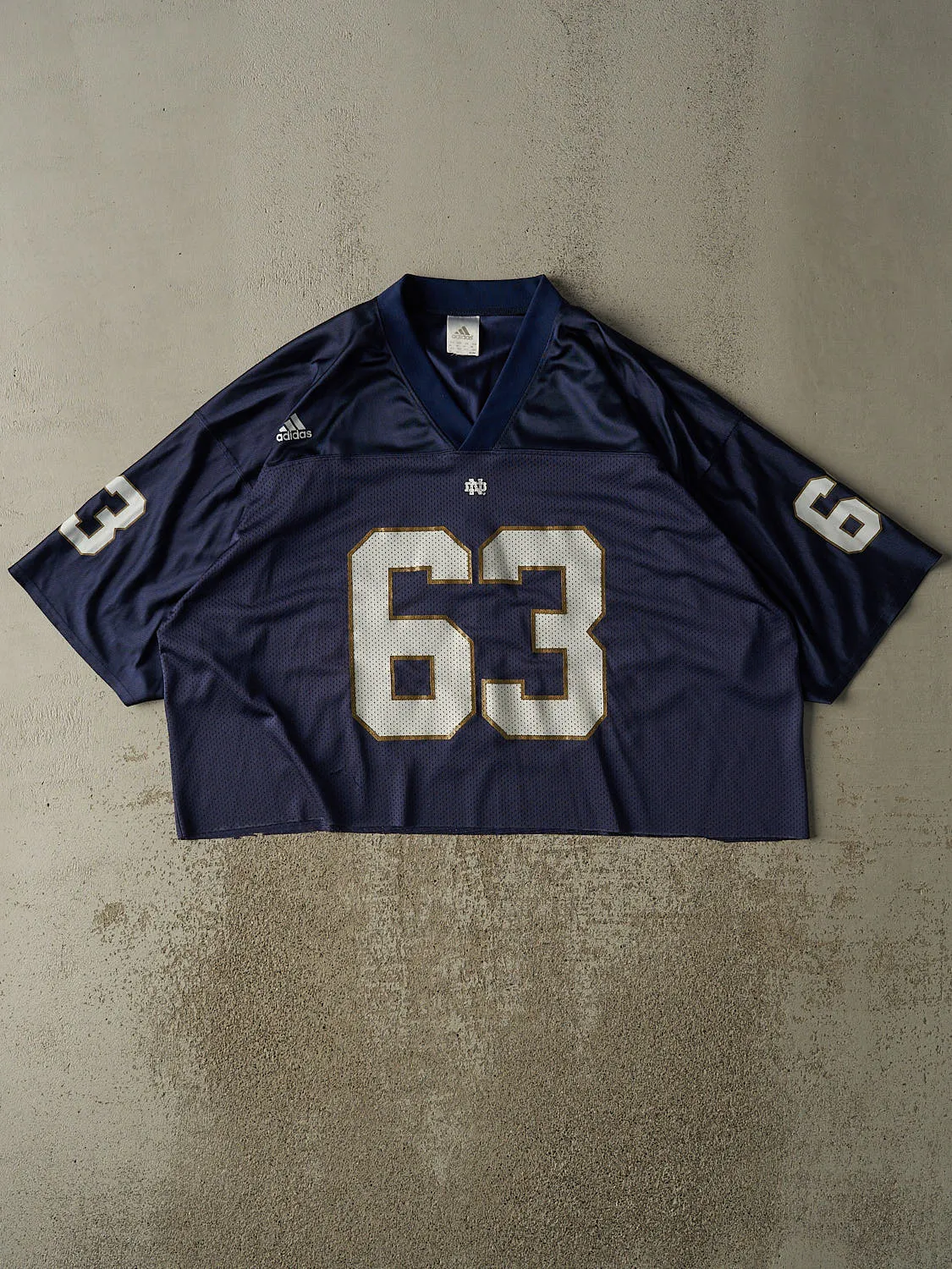 Vintage 90s Navy Blue Adidas University of Notre Dame Cropped Football Jersey (XL) sold by Rebalance Vintage