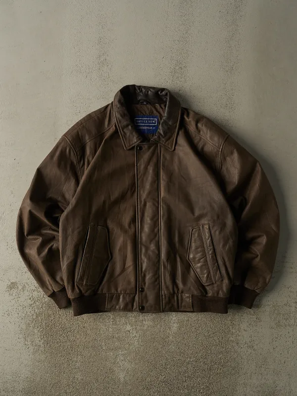 Vintage 90s Brown Leather Bomber Jacket (L/XL) sold by Rebalance Vintage